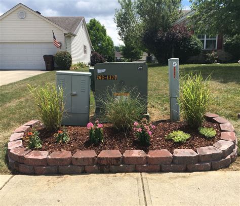 fencing to hide electrical box in yard|electrical boxes in front yard.